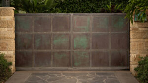 A Black Color Gate With Metal Sheet Closeup