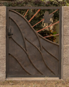 A Brown Color Gate Between Wall