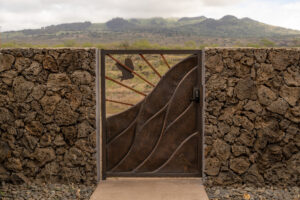 A Brown Color Gate Between Wall