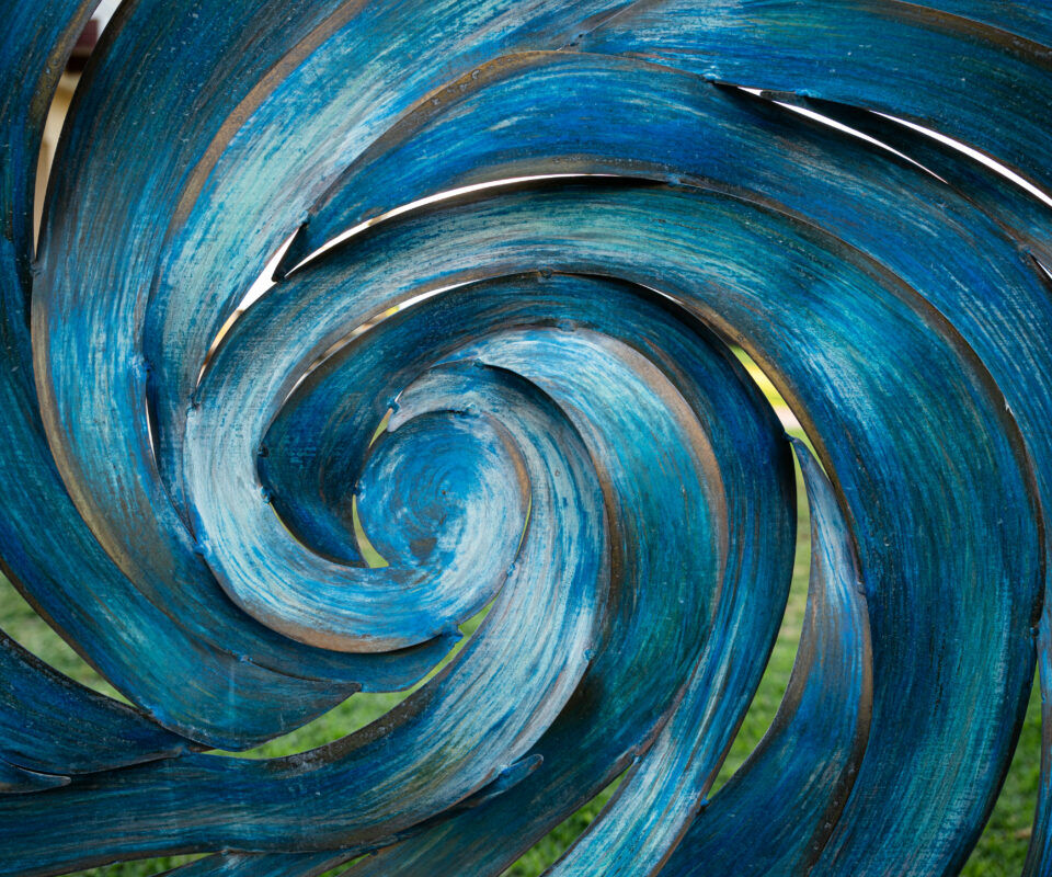 Abstract blue and gray spiral swirl painting with textured brushstrokes.