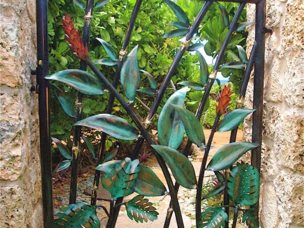 Small garden gate with painted metal foliage