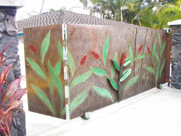 A decorative metal gate with a painted leaf design.