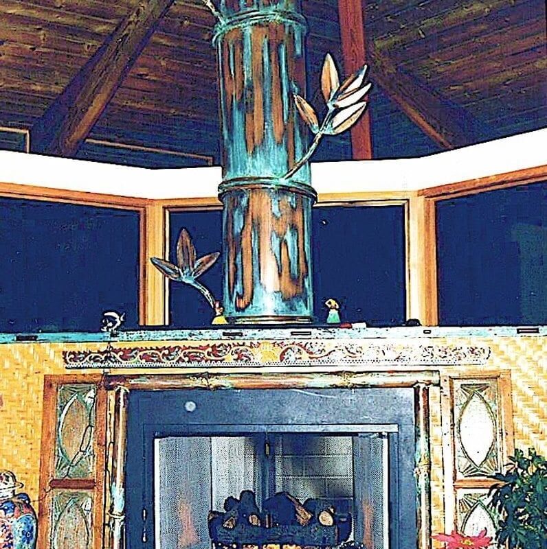 Cozy indoor fireplace with rustic wooden ceiling and decorations.