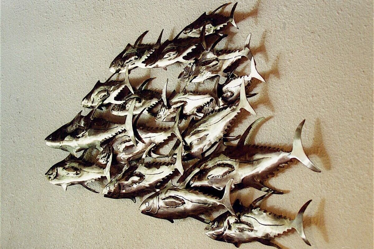 A creative wooden sculpture shaped like a fish.