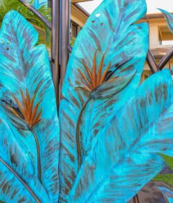Bright blue and orange feather artwork with intricate detailing.