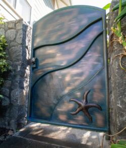 Decorative metal gate with a starfish design.
