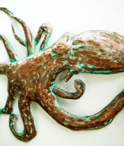 A realistic sculpture of an octopus with detailed tentacles.