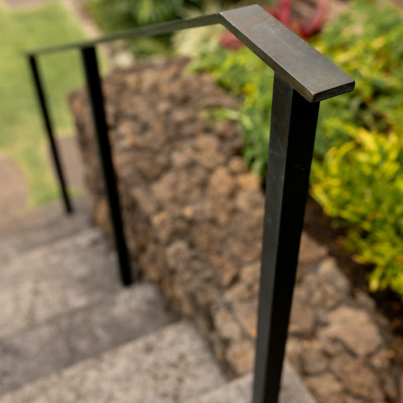Close-up of metal stair handrail